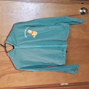 Disney woman's size medium green cropped Winnie-the-Pooh hoodie.